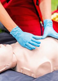 CPR or cardiopulmonary resuscitation. Educator demonstrating first aid lifesaving technique